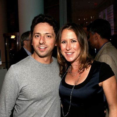 Sergey Brin and Anne Wojcicki posing for a photo shoot. 